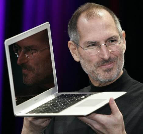 Apple CEO and co-founder Steve Jobs shows off the new Macbook Air ultra portable laptop during his keynote speech at Macworld.